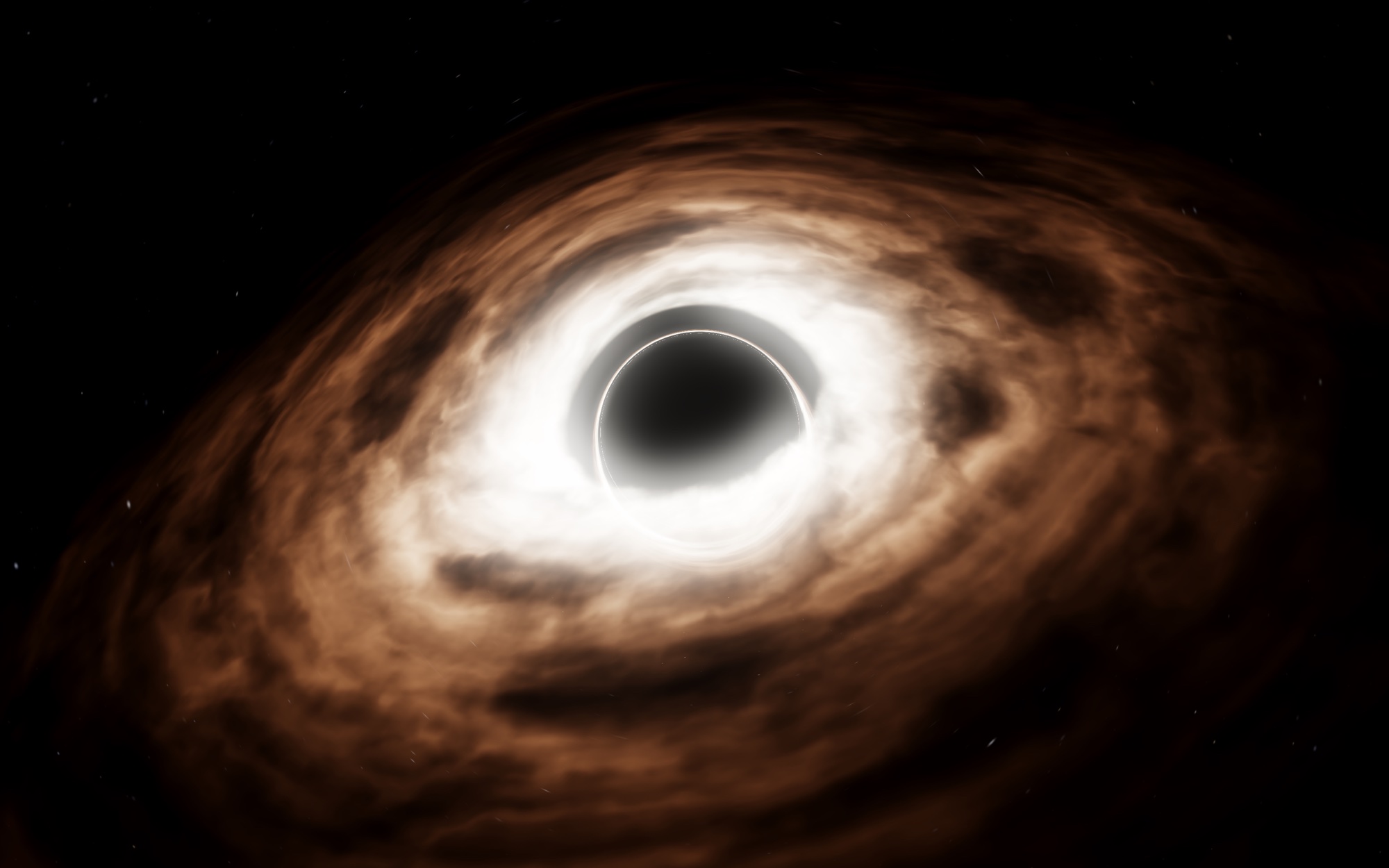 Glowing gas surrounds a black hole in Gargantua.